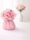 Baby Pink Satin Ribbon Rose Bouquet – handcrafted baby pink satin rose with tulle organza sparkle wrap, white filler blooms and polka-dot ribbon bow, ready-to-gift decorative arrangement