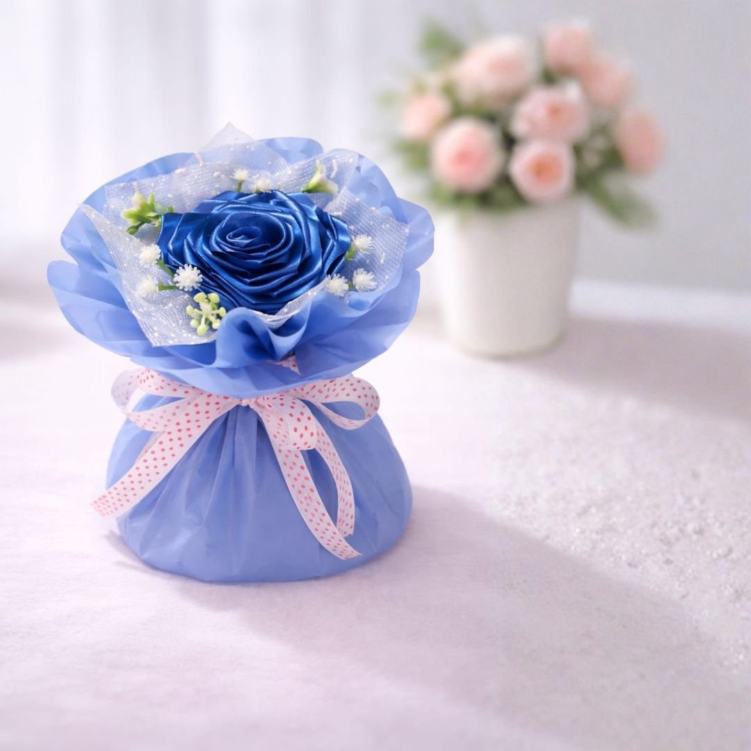 Blue Satin Ribbon Rose Bouquet – handcrafted decorative floral arrangement with ribbon roses and accent greenery for gifting and home décor